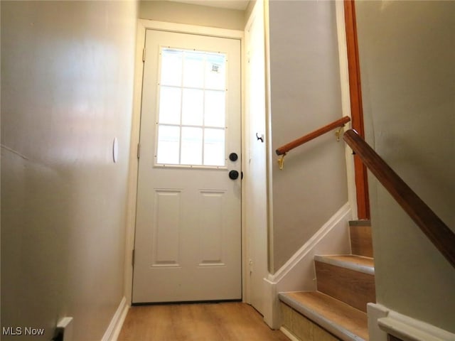 doorway to outside featuring light hardwood / wood-style floors