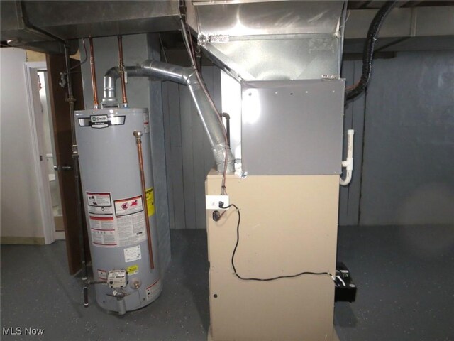 utilities featuring heating unit and gas water heater