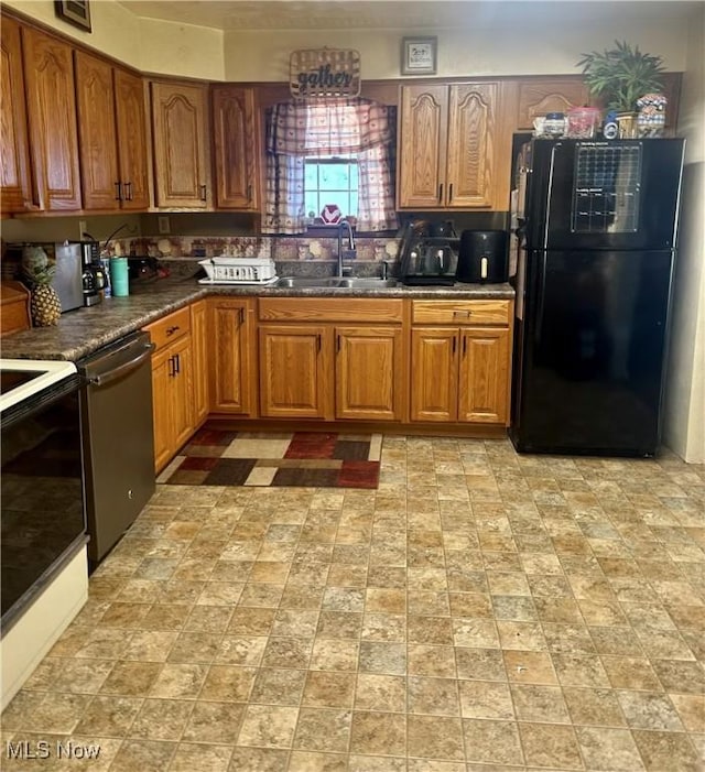 kitchen with sink and black appliances