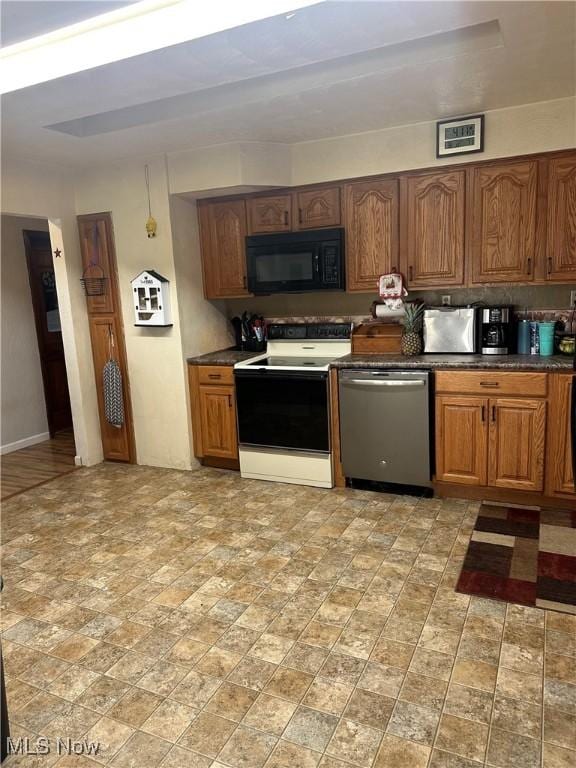 kitchen featuring dishwasher and electric range