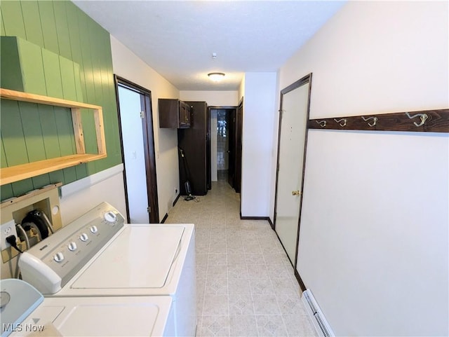 laundry room featuring separate washer and dryer