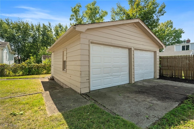 garage with a lawn