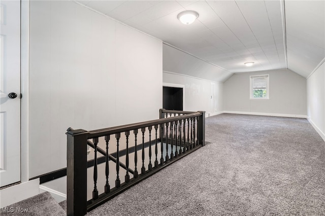 bonus room featuring lofted ceiling and carpet