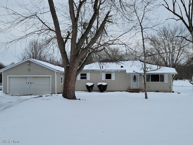 ranch-style home featuring a garage