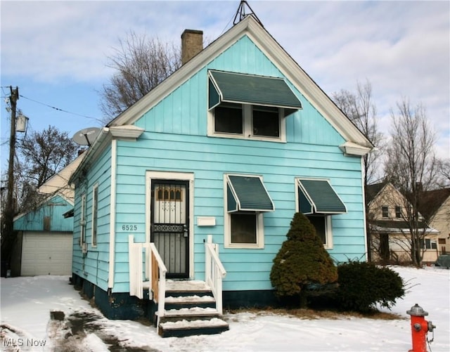 bungalow-style house with a garage