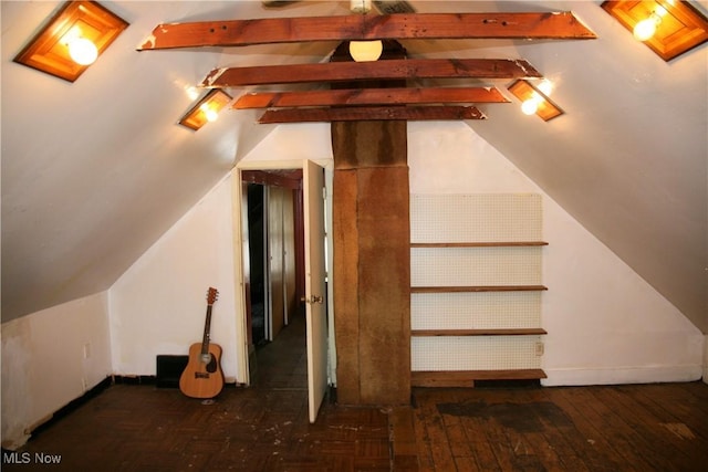 bonus room featuring vaulted ceiling with beams and dark hardwood / wood-style floors