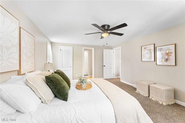 bedroom with carpet, ceiling fan, and a closet