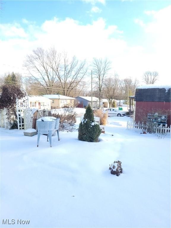 view of snowy yard