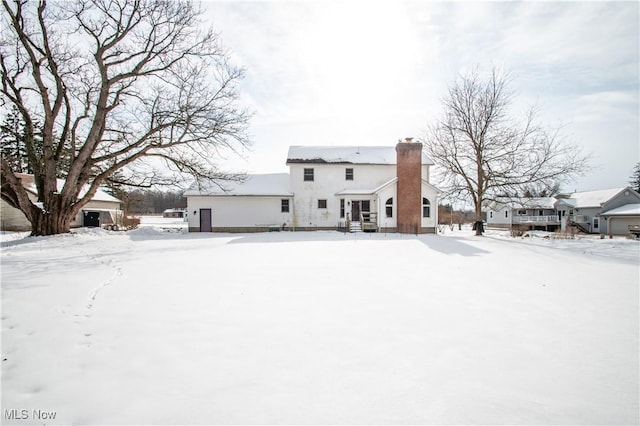 view of snow covered property