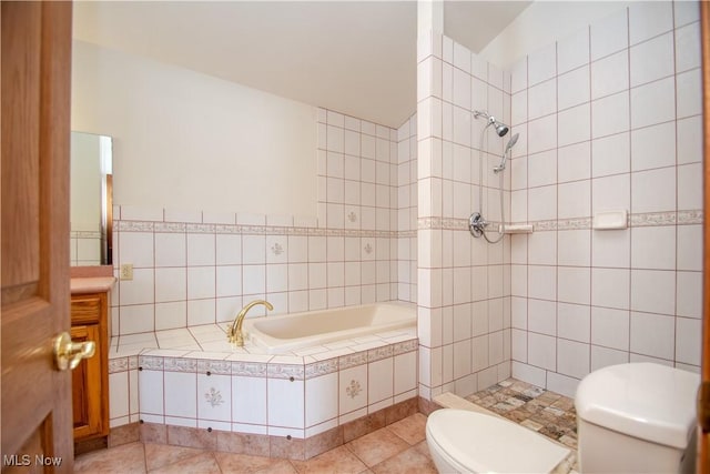 bathroom featuring tile patterned flooring, separate shower and tub, tile walls, and toilet