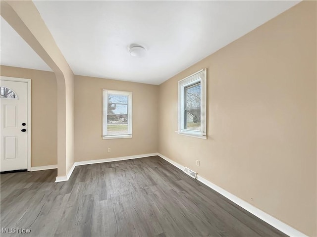 foyer entrance with light wood-type flooring