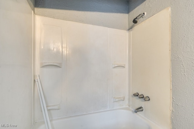 bathroom featuring bathing tub / shower combination