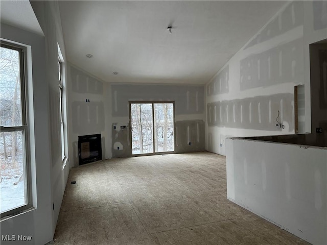 unfurnished living room with a fireplace