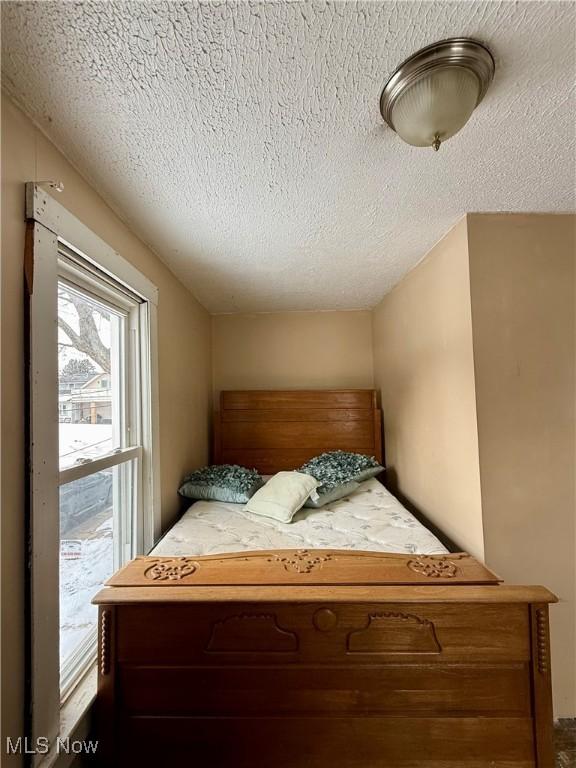 bedroom with a textured ceiling