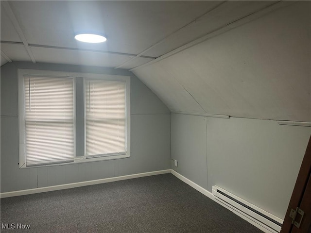 bonus room with vaulted ceiling, carpet, and baseboard heating