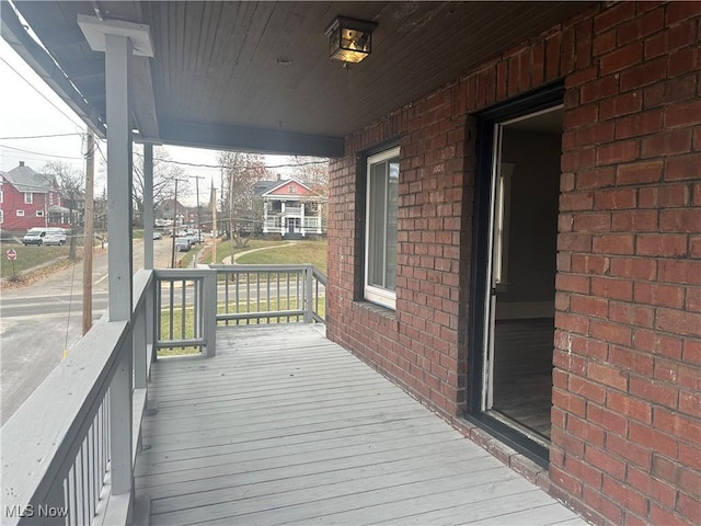 wooden deck featuring a porch