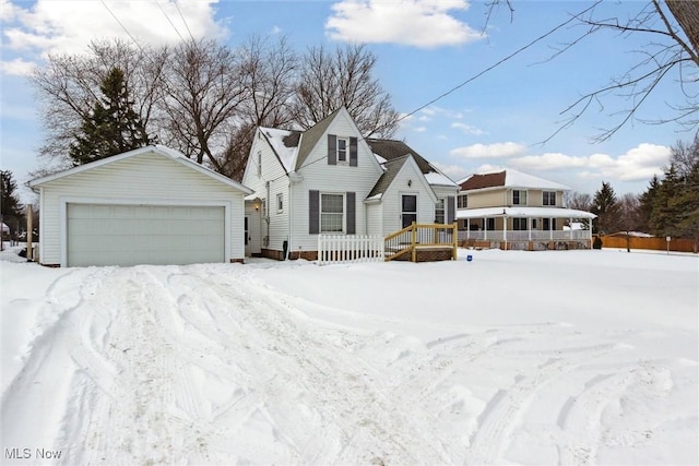 view of front of house featuring an outbuilding and a garage