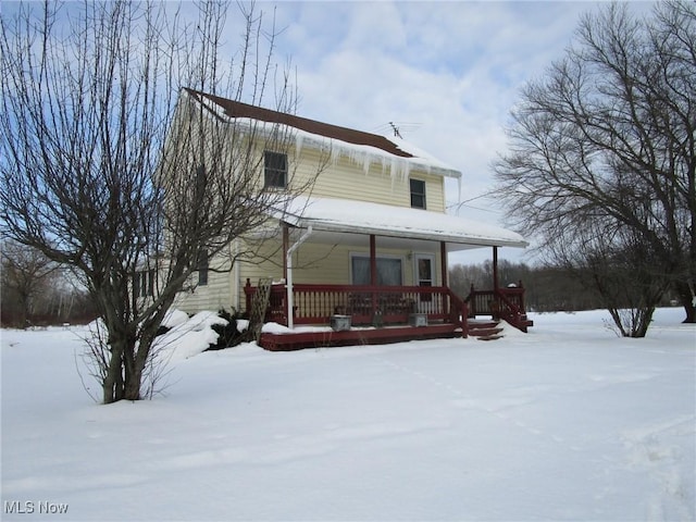 farmhouse-style home with covered porch