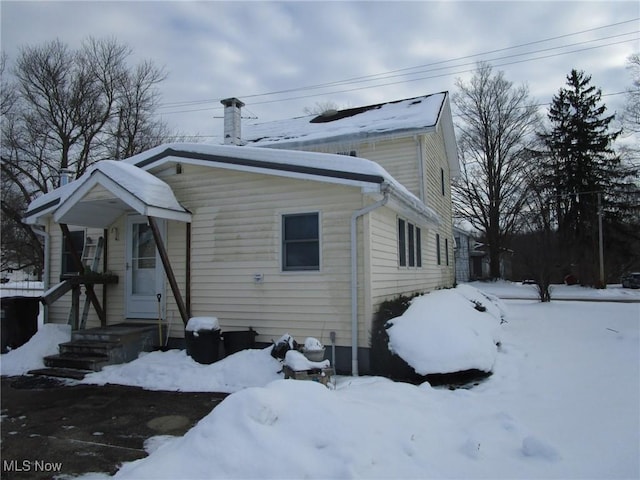 view of snow covered property