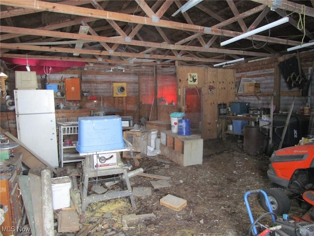 garage with white fridge