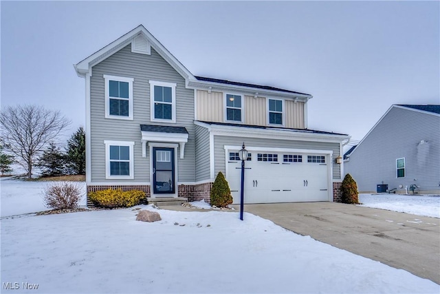 front of property with a garage