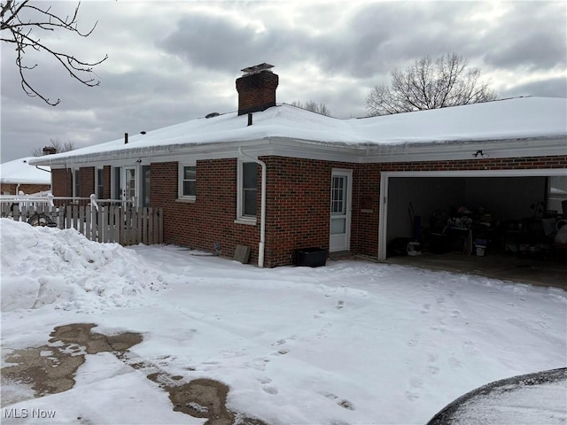 exterior space with a garage