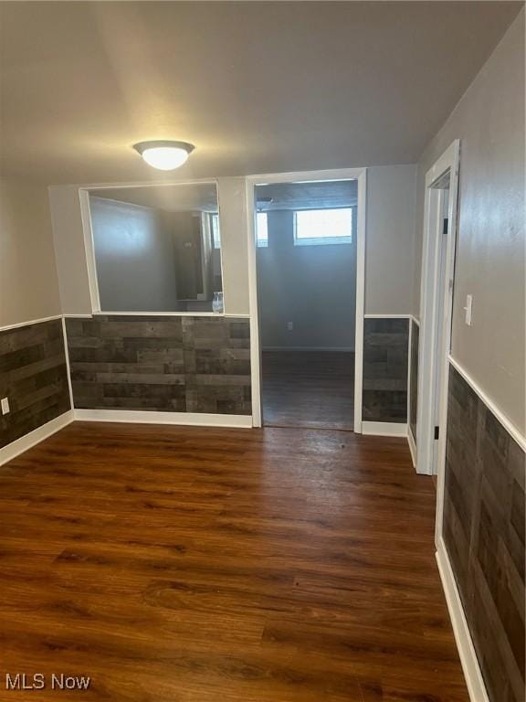 interior space with dark hardwood / wood-style floors