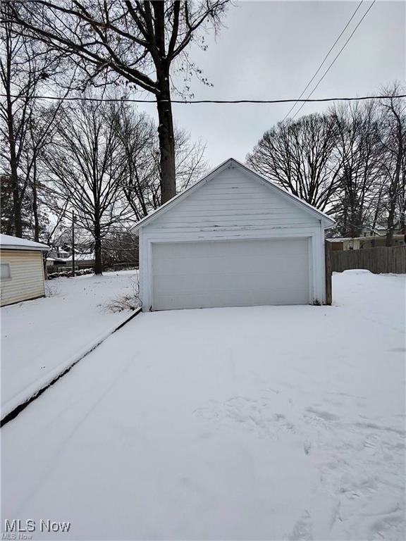 view of snow covered garage