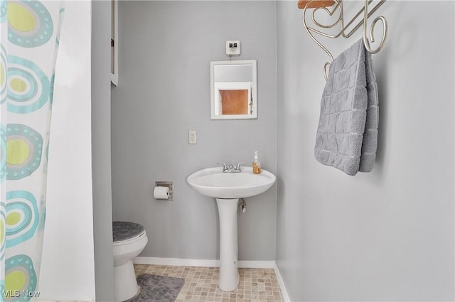 bathroom featuring toilet