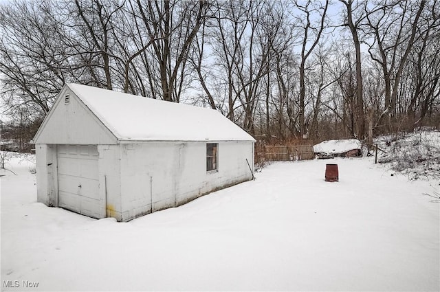 view of snow covered garage