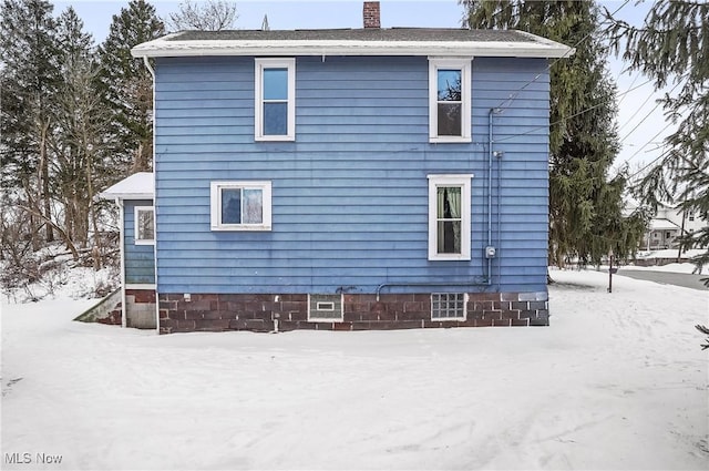 view of snow covered property