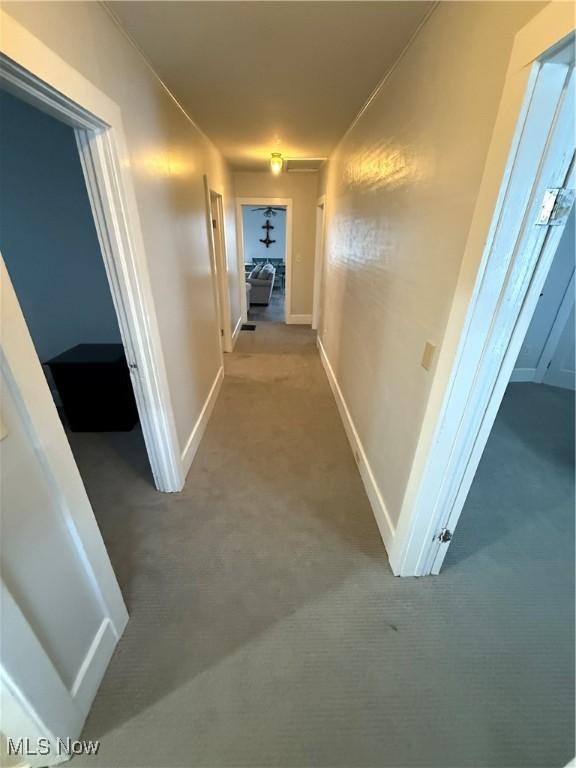 corridor featuring carpet