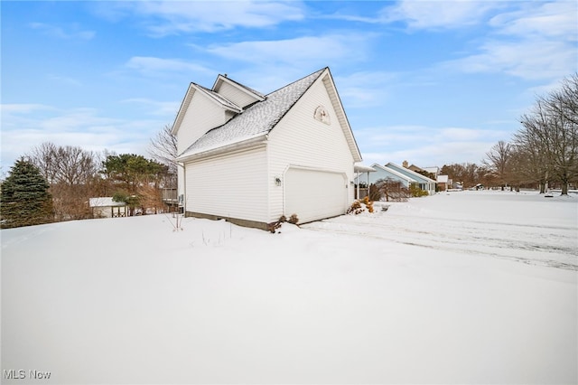 view of snow covered property