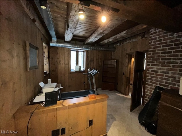 basement with wood ceiling, carpet floors, and wood walls