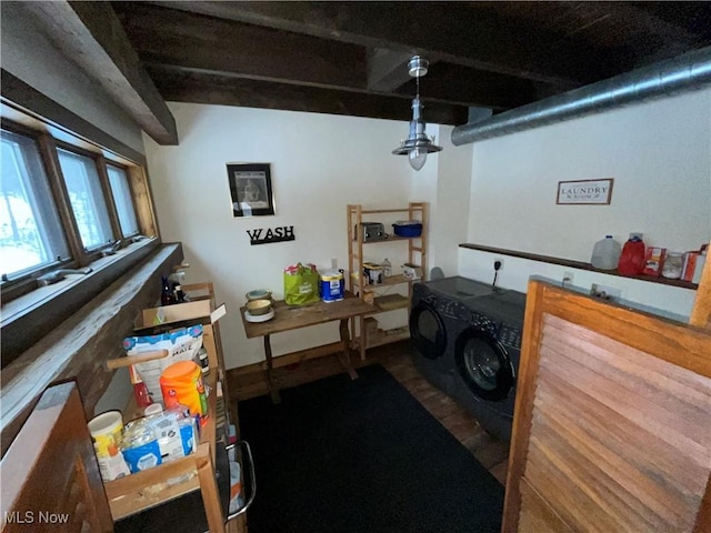 clothes washing area with independent washer and dryer