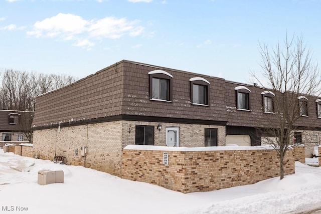 view of snow covered property