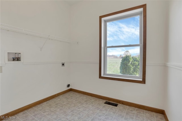 washroom featuring electric dryer hookup and washer hookup