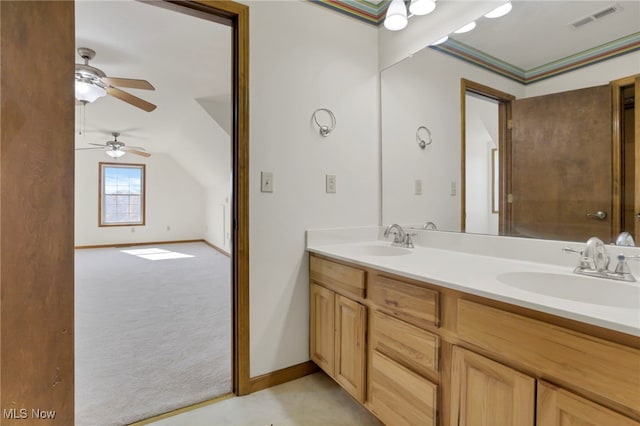 bathroom featuring vanity and ceiling fan