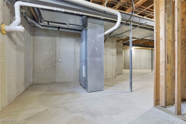 basement featuring heating unit