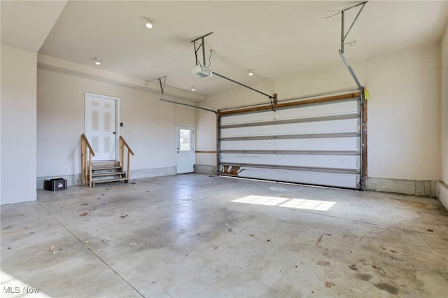 garage featuring a garage door opener