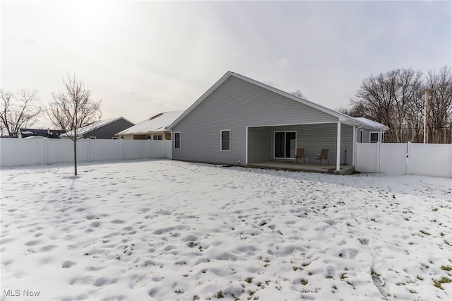 view of snow covered property