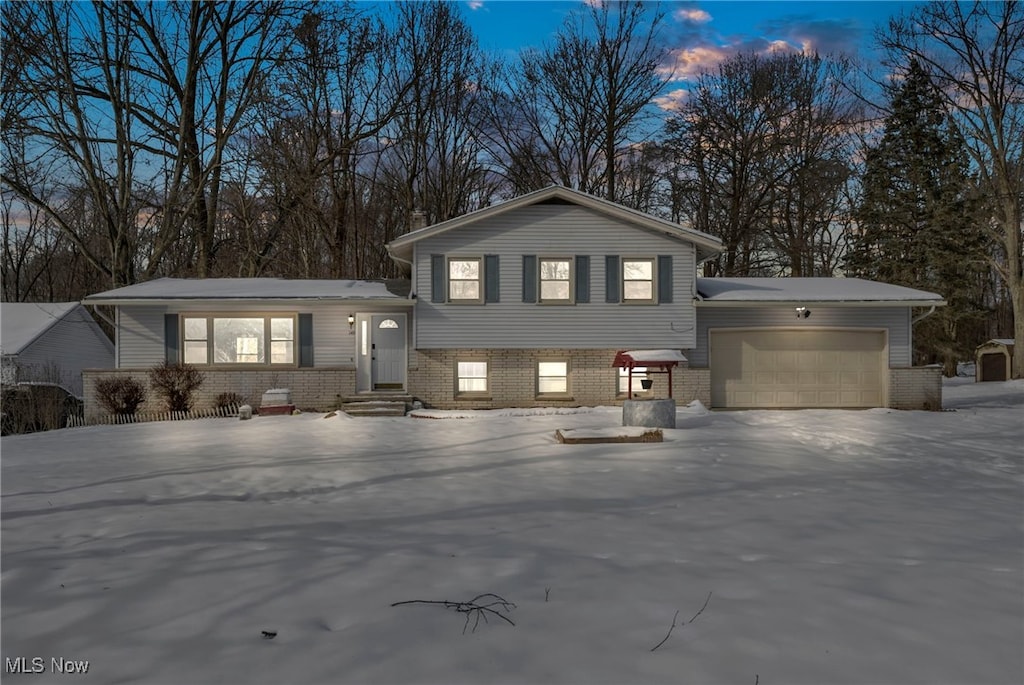 split level home with a garage