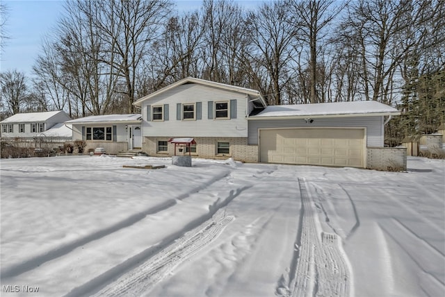 split level home with a garage