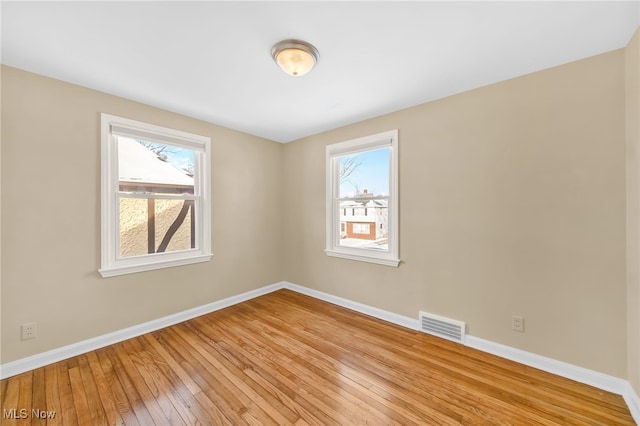 empty room featuring light hardwood / wood-style floors