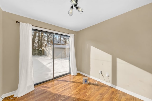 empty room featuring hardwood / wood-style flooring