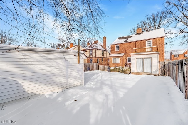 view of snow covered property