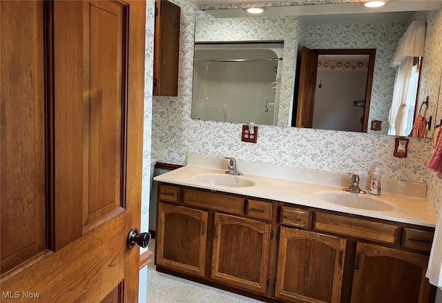 bathroom featuring vanity and walk in shower
