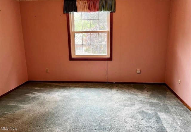 view of carpeted spare room