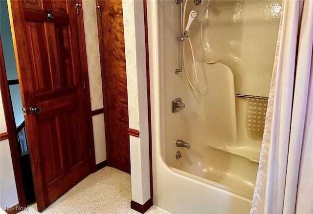 bathroom featuring shower / tub combo