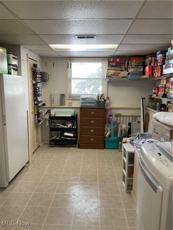 clothes washing area featuring washer / clothes dryer